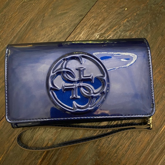 Guess Handbags - Guess cobalt and tan clutch